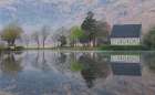 Ireland-Cork-Gougane Barra Church and mountain reflections in lake Art Print